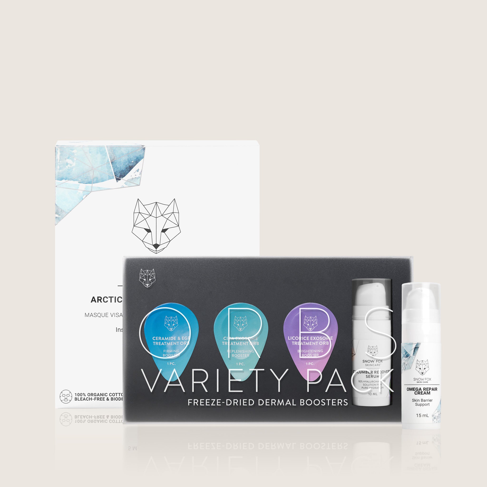 Snow Fox Skincare Freeze Dried Dermal Boosters Variety Pack of Orbs with a Box of Snow Fox Arctic Breeze Sheet masks and mini Omega Repair Cream on beige background