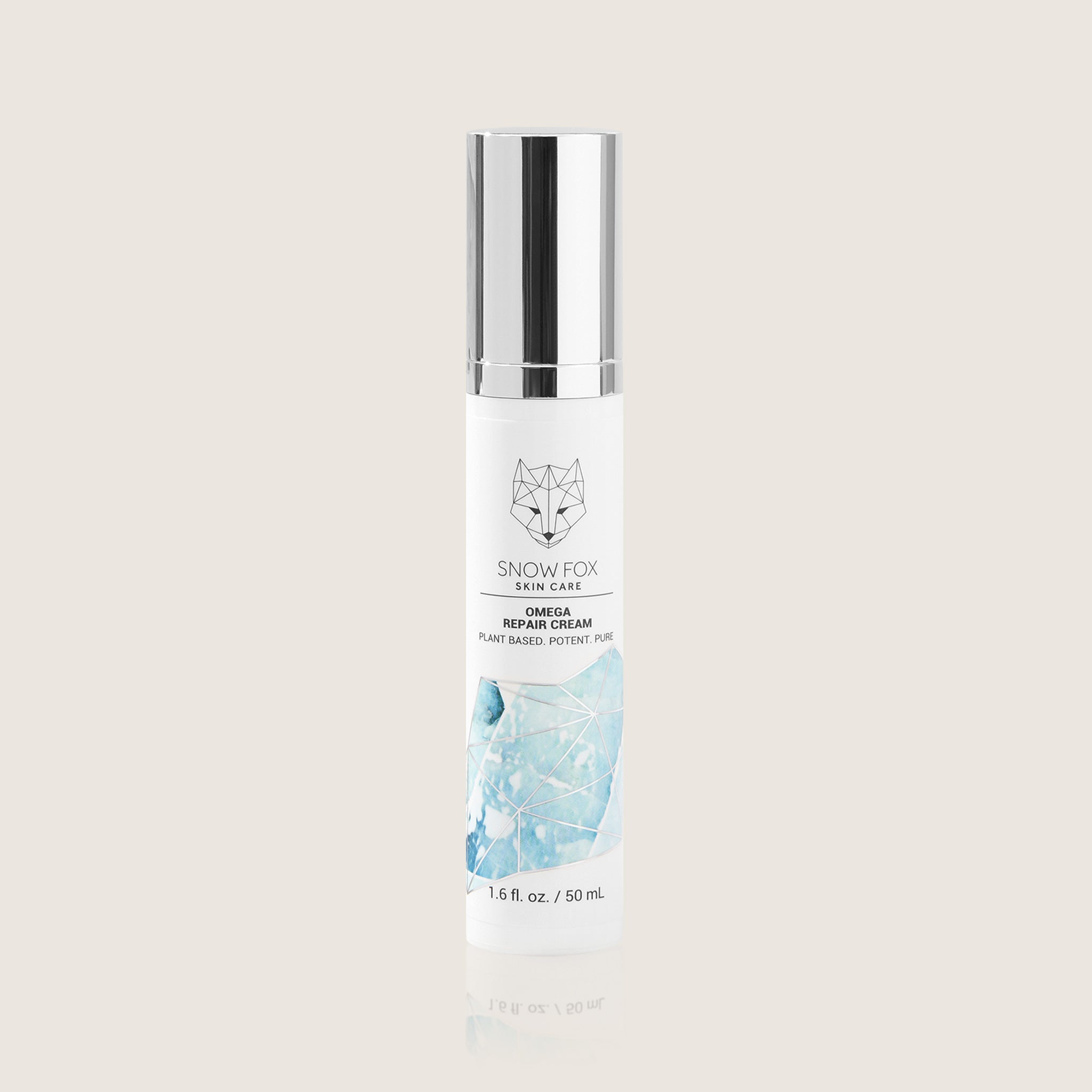 omega Repair cream bottle with 'Snow Fox Skincare branding on a light gray background