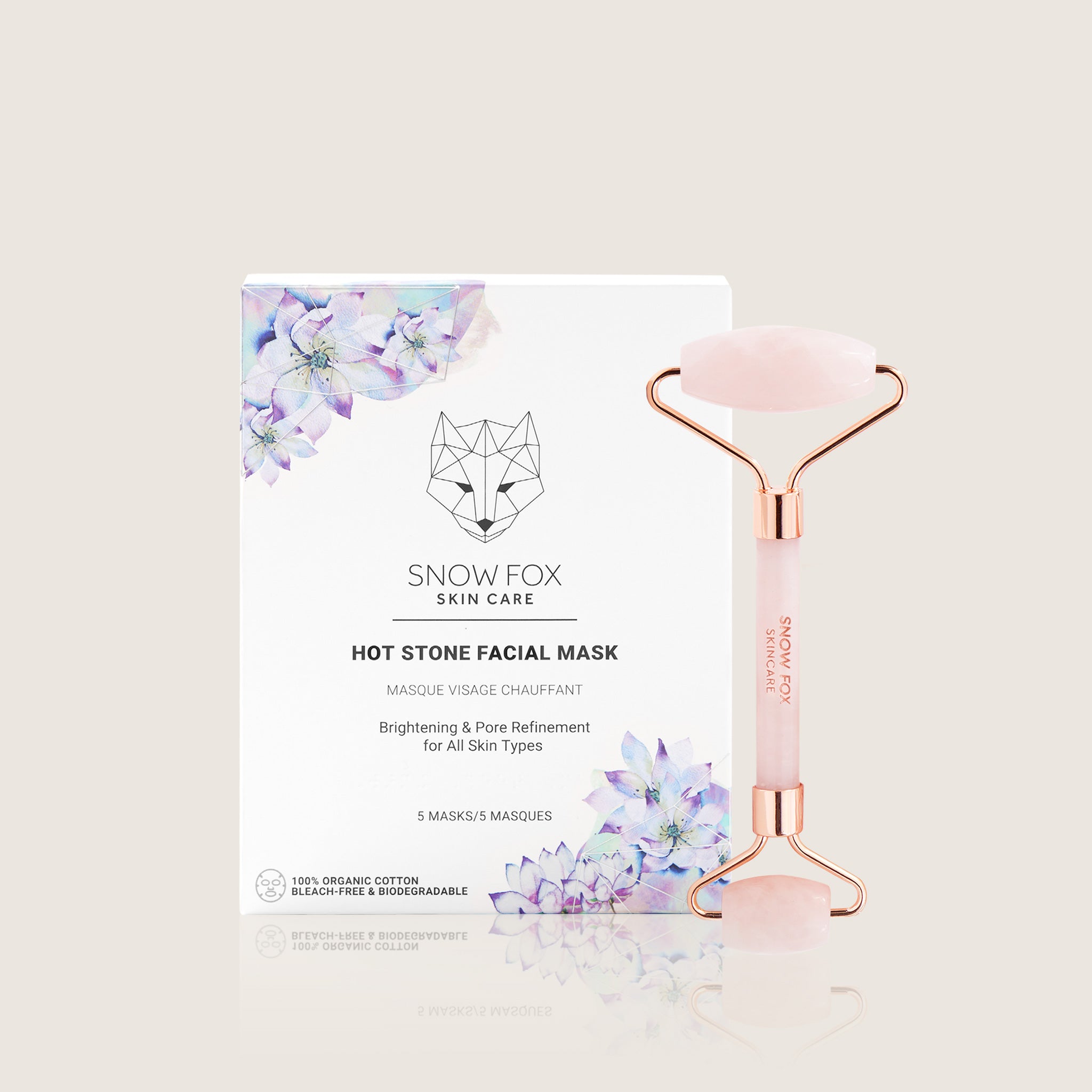 Snow Fox skin care hot stone facial masks with rose quartz roller on a white background