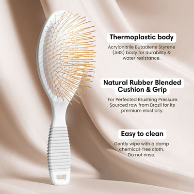 Stimulate acupressure points and promote healthy hair growth with our 24k gold-plated Gua Sha Hair & Scalp Brush.