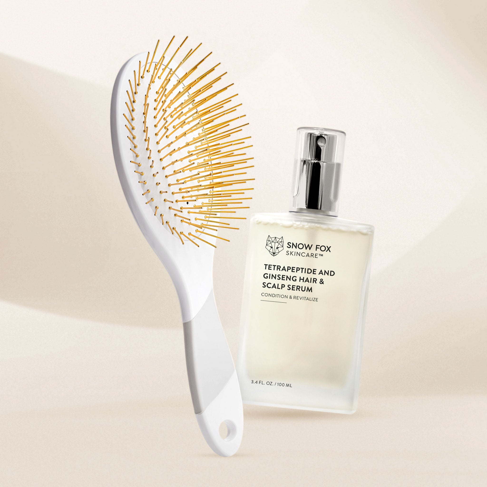 Snow Fox skincare tetrapeptide Hair full sized serum bottle with a white edition Gua Sha brush on a beige background