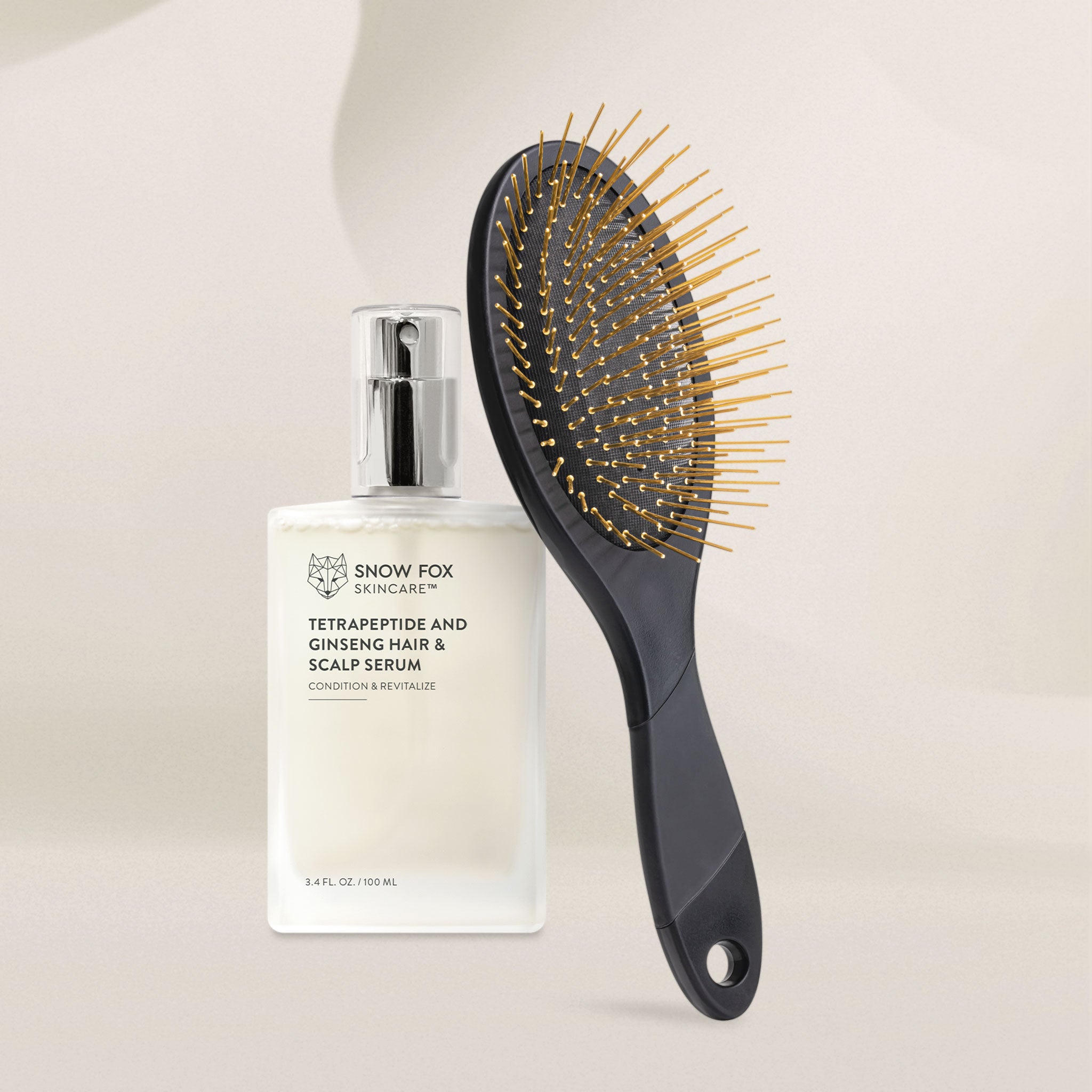 Snow Fox skincare tetrapeptide hair serum bottle with a black Gua Sha brush on a light background