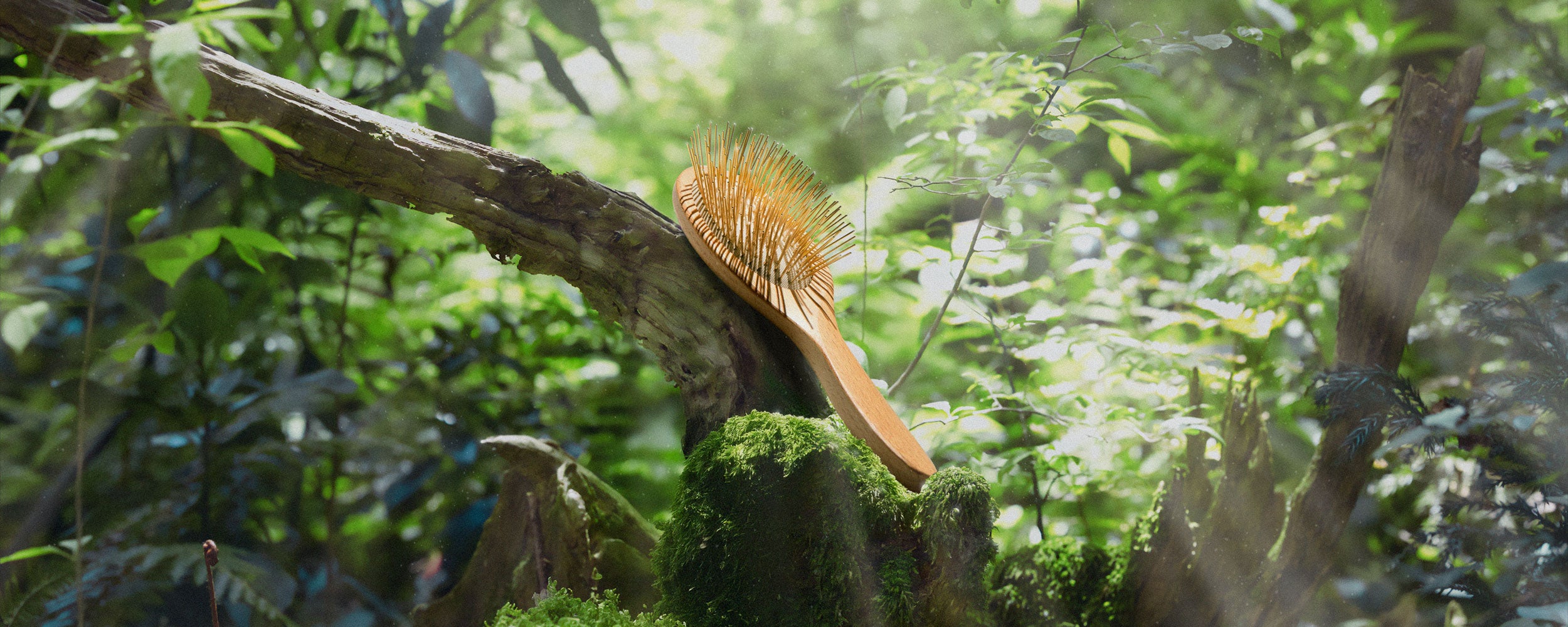 Wooden Gua Sha hairbrush on a branch with a natural background, featuring 24K Gold plated Acupressure needles for improving thinning hair and scalp health