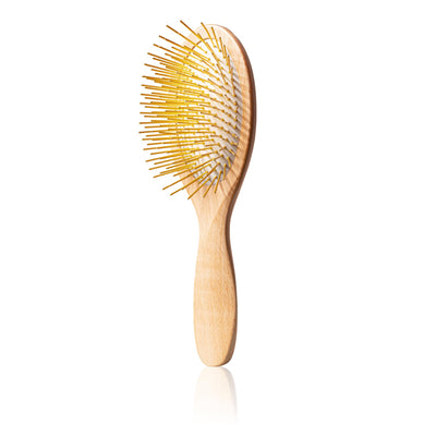 Stimulate acupressure points and promote healthy hair growth with our hand carved 24K gold-plated, premium wooden Gua Sha Hair & Scalp Brush.