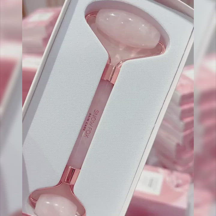 Rose quartz video pale pink natural color facial roller